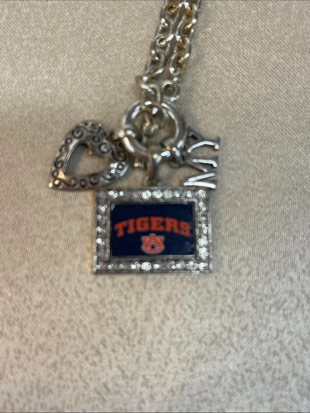 Unknown￼ team pendant